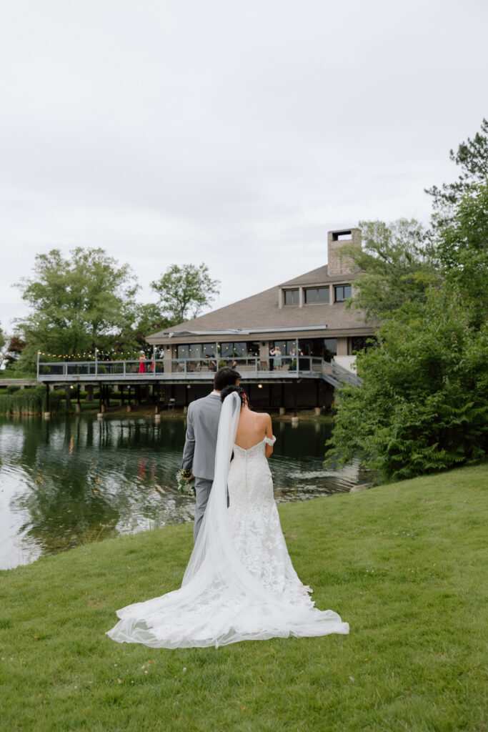 Wedding at Watersedge Wedding Venue in Columbus, Ohio, bride and groom in front of venue